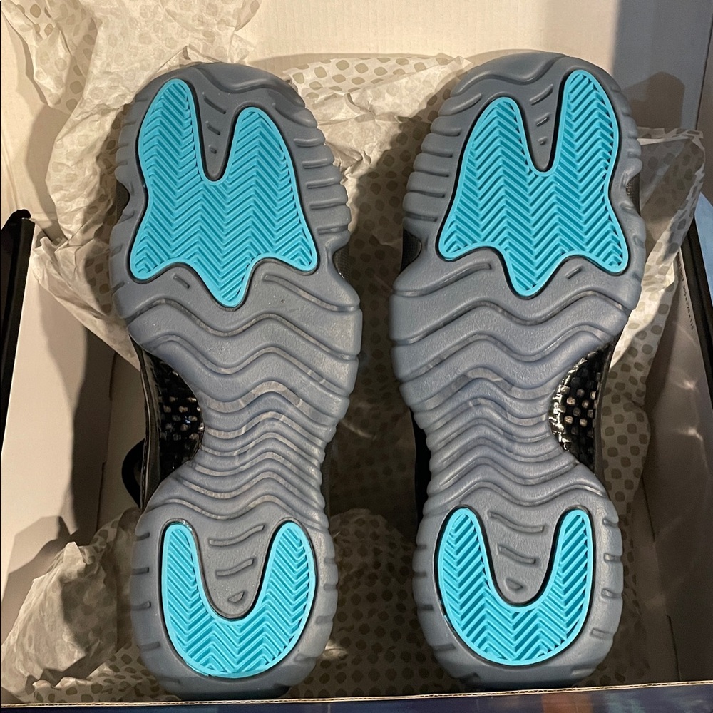 Kids Air Jordan 11 Retro Gamma
Black and Blue High-Top Sneakers - Picture 3 of 7